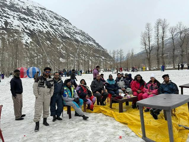 Group enjoying a snowy mountain outing